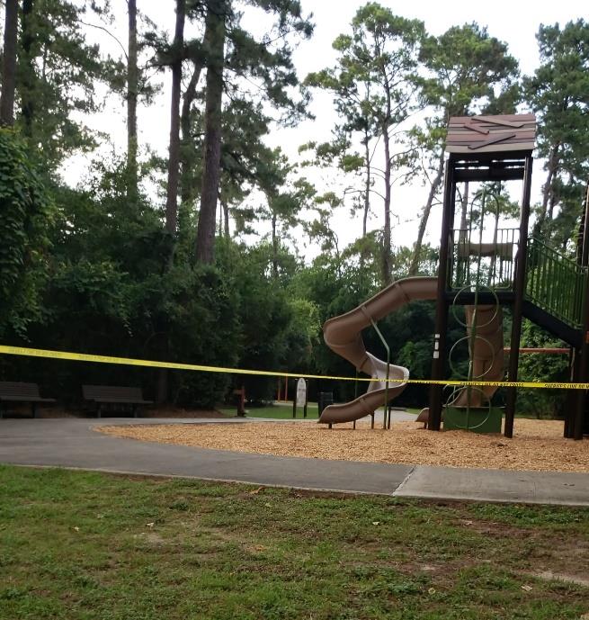 Photo of children's jungle gym at Sunset Park with crime scene tape.